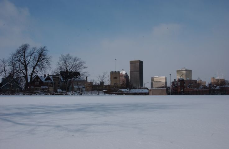Rochester NY Skyline as seen over the snow covered lawn of Monroe Middle School. 24 hour fresh 11:55 AM Jan 20th 2004 RocPic.Com POD - Rochester NY Picture Of The Day from RocPic.Com winter spring summer fall pictures photos images people buildings events concerts festivals photo image at new images daily Rochester New York Fall I Love NY I luv NY Rochester New York Jan 2004 POD Winter view picture photo image pictures photos images