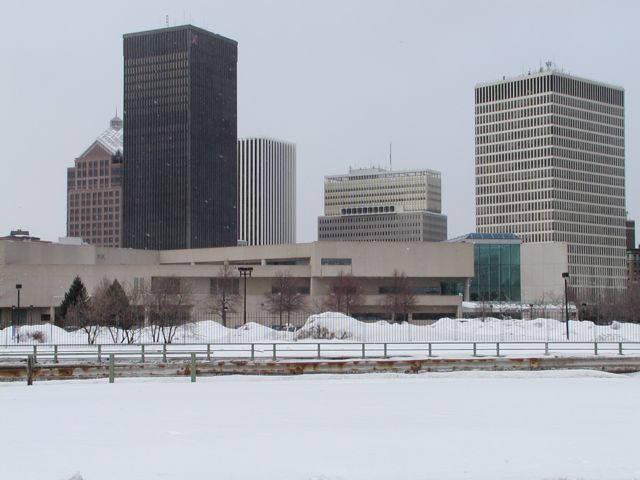 Photo view from South Union Street, behind the Strong Museum of Rochester skyline. Bausch & Lomb, Xerox, Linconln Tower, Midtown Plaza, HSBC building visible. Snow covered Rochester NY New York City living January 22nd 2003 POD I Love NY Rochester NY New York Picture Of The Day view picture photo image pictures photos images, January 22nd 2003 POD