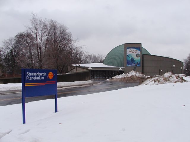 Picture Strasenburgh Planetarium Rochester Museum & Science Center, 657 East Ave. Rochester, NY 14607 (585) 271-4320 then press number 5 . With the tragic loss of the 7 Astronauts aboard the space shuttle Columbia Feb 1st, I felt compelled to visit the Strasenburgh Planetarium grounds.  Opened in 1968, when I was 11, I like thousands and perhaps now millions of Rochster area students explored space often via annual school field trips. Rochester NY New York City living February 2nd 2003 POD I Love NY Rochester NY New York winter Picture Of The Day view picture photo image picture pictures photos images, February 2nd 2003 POD