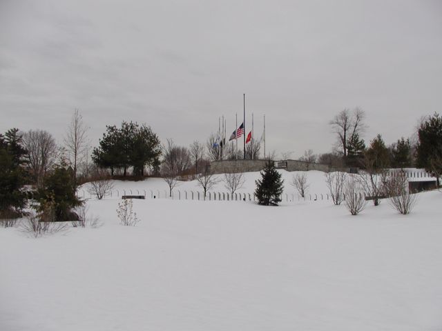 Picture Flags fly at half staff on the grounds of the Vietnam Veterans Memorial, South Ave at Highland Ave, Rochester NY, as the U.S. and most of the world mourns the loss of the 7 astronauts aboard the space shuttle Columbia. Rochester NY New York City living February 4th 2003 POD winter Picture Of The Day view picture photo image picture pictures photos images, February 4th 2003 POD