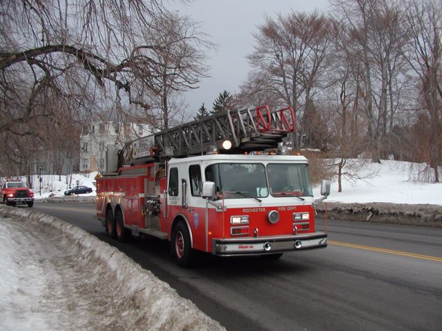 Picture Rochester Fire Department Ladder Truck rounds the curve South Ave and Reservoir Ave. Www.RochesterFD.Com Rochester NY New York City living February 6th 2003 POD winter Picture Of The Day view picture photo image picture pictures photos images, February 6th 2003 POD