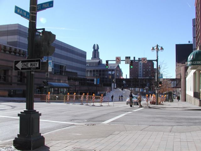 Picture intersection of East Main Street and Saint Paul Street looking West. Photo taken during the Coldrush Festival, the Downtown Downhill -snow mound- is positioned in front of the Rochester Riverside Convention Center February 10th 2003 POD winter Picture Of The Day view picture photo image picture pictures photos images, February 10th 2003 POD