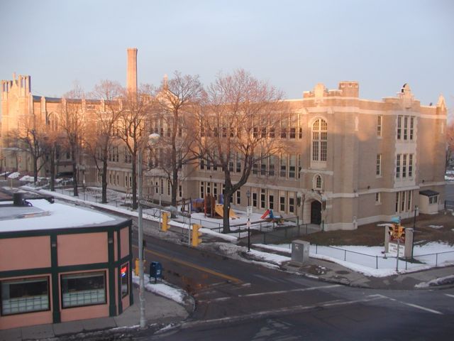 Picture Sunset shines on Blessed Sacrament Church and Corpus Christi School Rochester NY winter view. Rochester NY March 2nd 2003 POD winter Picture Of The Day view picture photo image picture pictures photos images