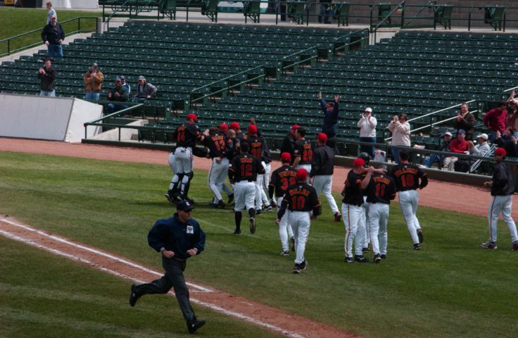 Picture - The Rochester Red Wings Swarm Augie Ojeda after his two-out RBI single in the 11th inning scored Jason Tyner, capping a three-run rally and giving the Red Wings a 9-8 win over the Pawtucket Red Sox today in a weekday matinee game. Fresh 2:25 PM. Apr 27th 2005 - Rochester NY Picture Of The Day from RocPic.Com spring summer fall winter pictures photos images people buildings events concerts festivals photo image at new images daily Rochester New York Fall I Love NY I luv NY Rochester New York 2004 POD view picture photo image pictures photos images