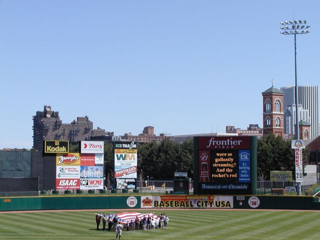 Picture Sunday afternoon at the ballpark with the Rochester Red Wings at Frontier Field Rochester NY. Baseball, Hot Dogs, and American Pride were big in this town long before they wrote songs about it. Rochester New York Picture Of The Day from DigitalSter.Com & RocPic.Com spring summer fall winter pictures photos images people buildings events concerts festivals photo image at digitalster.com new images daily 2003 Rochester New York Spring I Love NY I luv NY Rochester New York April 28th 2003 POD spring view picture photo image pictures photos images