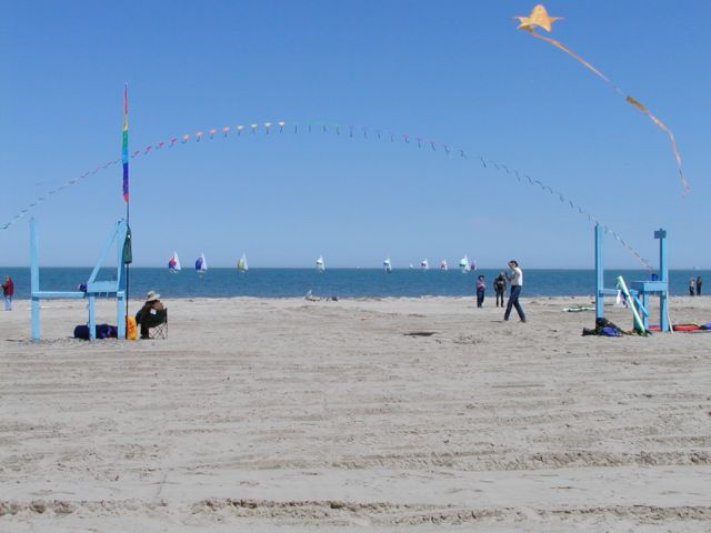 Picture Kite Flight 2003 Ontario Beach Park Rochester NY. Sailboats fill the background as they move across Lake Ontario, while those on land sail kites. Links on this page to photos and postcards of the same area courtousey of the Rochester Public Library. Rochester New York Picture Of The Day from DigitalSter.Com & RocPic.Com spring summer fall winter pictures photos images people buildings events concerts festivals photo image at digitalster.com new images daily 2003 Rochester New York Spring I Love NY I luv NY Rochester New York May 5th 2003 POD spring view picture photo image pictures photos images