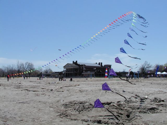 Picture Kite Flight 2003 Ontario Beach Park Rochester NY. The many kites kite outlines the bathhouse at Charlotte Beach aka Ontario Beach Park Links on this page to photos and postcards of the same area courtousey of the Rochester Public Library. Rochester New York Picture Of The Day from DigitalSter.Com & RocPic.Com spring summer fall winter pictures photos images people buildings events concerts festivals photo image at digitalster.com new images daily 2003 Rochester New York Spring I Love NY I luv NY Rochester New York May 6th 2003 POD spring view picture photo image pictures photos images