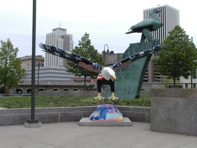 Picture - Birds of a Feather @ War Memorial - A new bird part of the ESL Animal Scramble joins an old bird outside the Rochester War Memorial on Court Street. Rochester NY Picture Of The Day from DigitalSter.Com & RocPic.Com spring summer fall winter pictures photos images people buildings events concerts festivals photo image at digitalster.com new images daily 2003 Rochester New York Spring I Love NY I luv NY Rochester New York May 16th 2003 POD spring view picture photo image pictures photos images