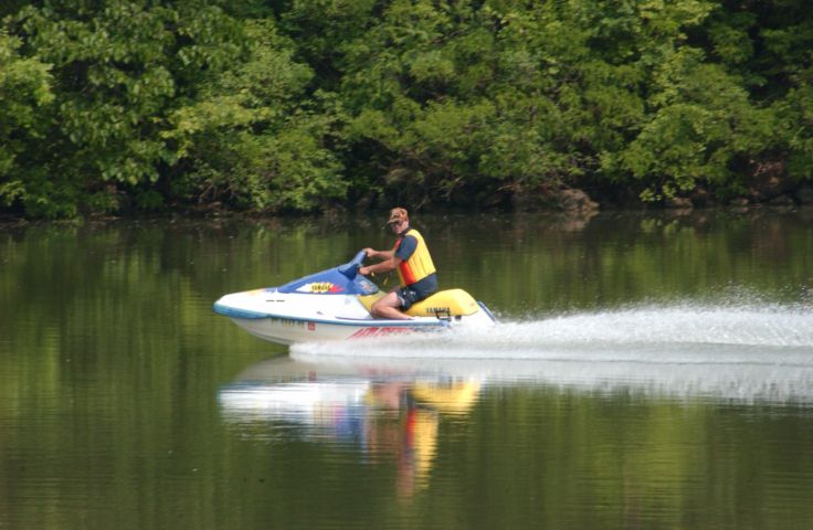 Picture - I Was On The Genesee River Trail When I Saw This Man Riding A Jet Ski Just South Of Downtown Rochester NY. 24 Hour Fresh 3:58 PM.June 11th 2005 POD. - Rochester NY Picture Of The Day from RocPic.Com spring summer fall winter pictures photos images people buildings events concerts festivals photo image at new images daily Rochester New York Fall I Love NY I luv NY Rochester New York 2005 POD view picture photo image pictures photos images