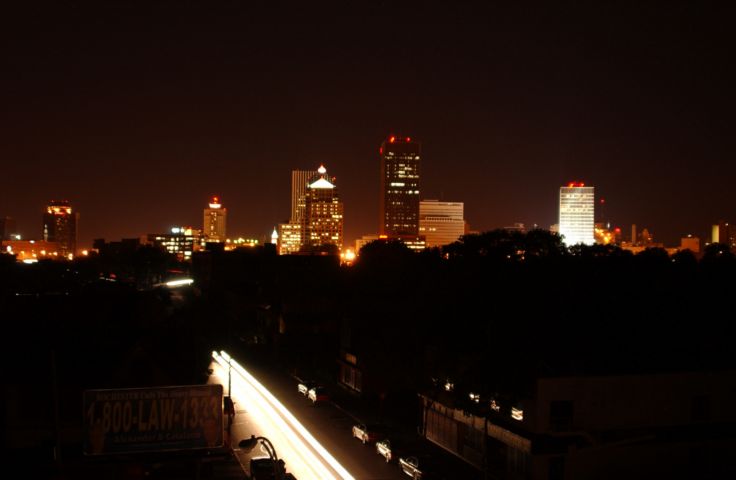 Picture - Dream Shot Blackout 2003 Skyline Rochester NY. It amazes me, how many pieces had to fall into place for me to capture the photos I shot during the Blackout of 2003. The Nikon D1X I used to photograph the power outage, is only about 3 weeks new to me.  Learning to use it in an adequate manner was interesting considering some of the confrontations I have had while shooting during the night... and in broad daylight here in America...  I'm glad the censors did not stifle my learning to a degree that I might have missed this photo opportunity. Enjoy, and if you like it when it is spooky out, visit poe.org  - Rochester NY Picture Of The Day from DigitalSter.Com & RocPic.Com summer fall winter spring pictures photos images people buildings events concerts festivals photo image at digitalster.com new images daily 2003 Rochester New York Summer I Love NY I luv NY Rochester New York Aug 18th 2003 POD summer view picture photo image pictures photos images