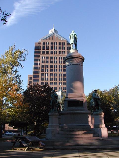 Photo Civil War Memorial Washington Square Park Rochester NY New York  Abraham Lincoln Tops a statue with a guard of Soldiers and Sailors below him.  Clinton Avenue downtown  Rochester NY New York Picture of the day Fall October 2002 Photo Todays Picture of Rochester NY New York Photos Pictures Image Images