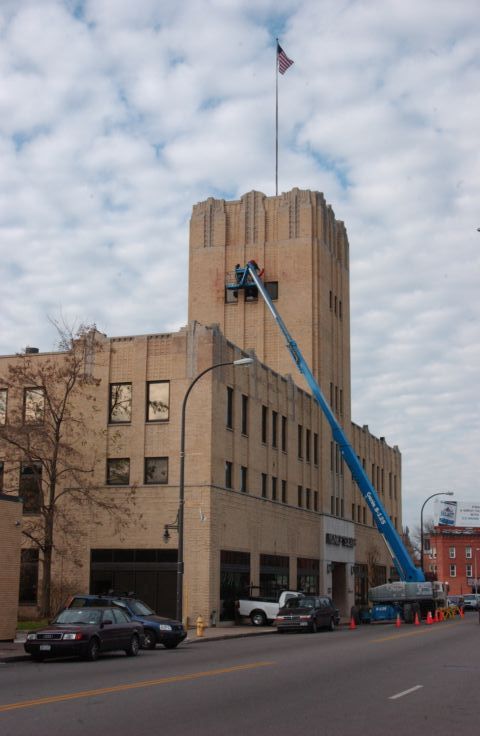 Picture - Workers Mount A 'Prefered Care' Sign On The Old Sears & Roebuck Building Rochester NY Nov 28th 2004 POD. - Rochester NY Picture Of The Day from RocPic.Com fall winter spring summer pictures photos images people buildings events concerts festivals photo image at new images daily Rochester New York Fall I Love NY I luv NY Rochester New York 2004 POD view picture photo image pictures photos images