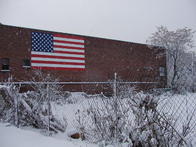 Rochester NY New York December 3rd  2002 POD Beauty Of Freedom Monroe Avenue With A Snowy Morning View Of An American Flag Painted On The Brick Of The Always Controversialy  Show World Home Of Former Monroe Theater Rochester NY Picture Of The Day Photo Photos Pictures Image Images