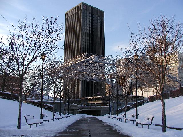 Rochester NY New York December 12th 2002 POD Snow Covered Park Benches And A Clear Path Lead To Concert Shell At Manhattan Square Park Xerox Tower In Background On A Late Fall Blue Sky Rochester Afternoon Rochester NY Picture Of The Day Photo Photos Pictures Image Images