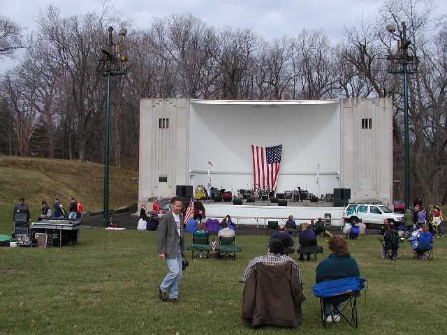 50,000 Watts of power, and heard in more than 30 USA States 1180 AM WHAM's Bob Lonsberry makes his way through the early morning arrivals to the Rally Round America celebration held in Highland Park Rochester NY April 19th 2003 Image 2 of 60  -  48 kB