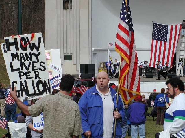 Extreme tolerance... opposite ends of the spectrum, a look of disbelief, those on the edges of this face off visibly upset at this persons protest amidst those celebrating in support of America, and U.S. Troops. Image 13 of 60  -  48 kB