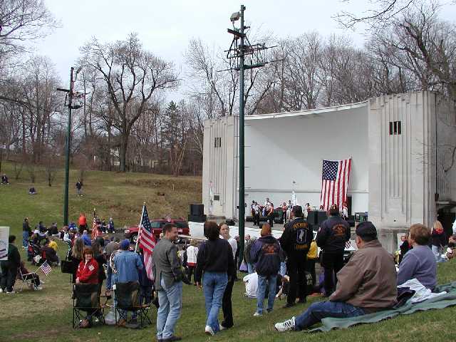 WHAM's Bob Lonsberry mingling in the crowd of Pro America, Pro Troops, supporters as Nik and the Nice Guys entertains the crowd prior to the days official ceremonies... Image 18 of 60  -  55 kB