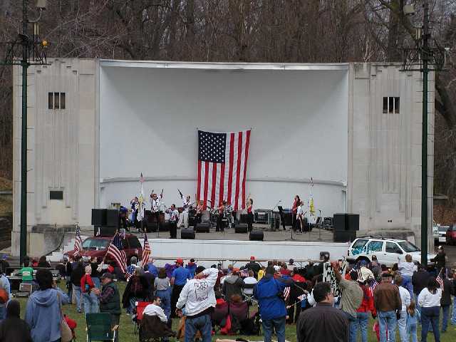 On stage, Rochester's own world famous party band, Nik & The Nice Guys gets the Saturday morning crowd up on their feet and moving with a few all American 50's tunes...  Image 22 of 60  -  43 kB