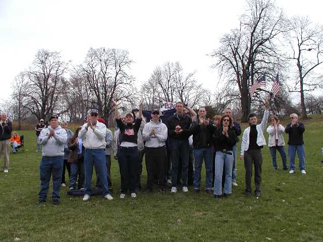 United We Stand! These Americans just said NO! to a protester who tried to rain on the Rally 'Round America celebration.  U.S. Troops rest assured, the vast MAJORITY of Americans wish you a safe and speedy return to America. Image 31 of 60  -  51 kB