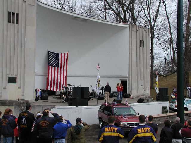 Veterans salute, all pay respect as Rhian and Cara Morgan lead the audiance in the National Anthem. Image 35 of 60  -  44 kB