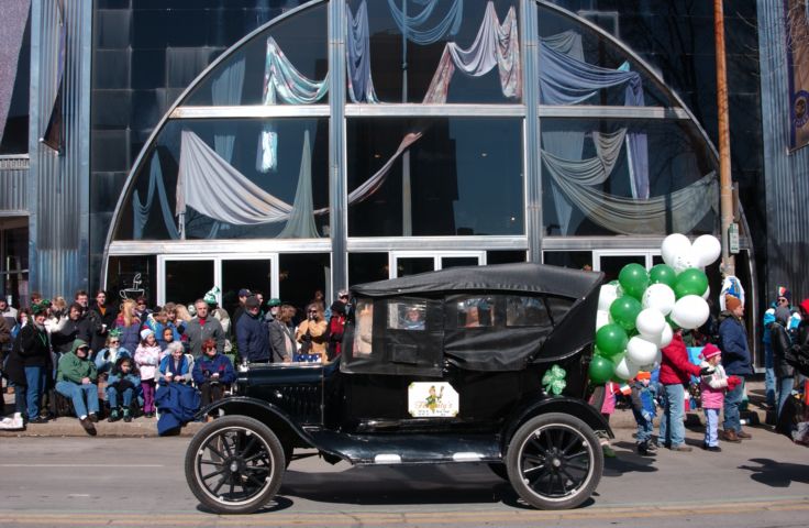 Picture Saint Patricks Day Parade Rochester NY. An old Ford passes the old Chevrolet building now Spot Coffee during Saturday's St. Patrick's Day Parade Mar 15th 2004 POD. - Rochester NY Picture Of The Day from RocPic.Com winter spring summer fall pictures photos images people buildings events concerts festivals photo image at new images daily Rochester New York Fall I Love NY I luv NY Rochester New York Jan 2004 POD Winter view picture photo image pictures photos images