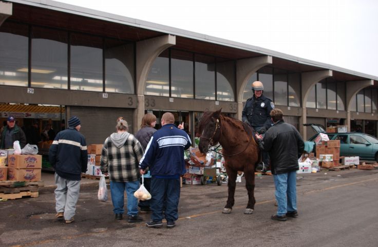 Picture Rochester Public Market shoppers pause to check out Officer Charlie Horst and his partner. Fresh 10:00 AM. Mar 20th 2004 POD. - Rochester NY Picture Of The Day from RocPic.Com winter spring summer fall pictures photos images people buildings events concerts festivals photo image at new images daily Rochester New York Fall I Love NY I luv NY Rochester New York Jan 2004 POD Winter view picture photo image pictures photos images